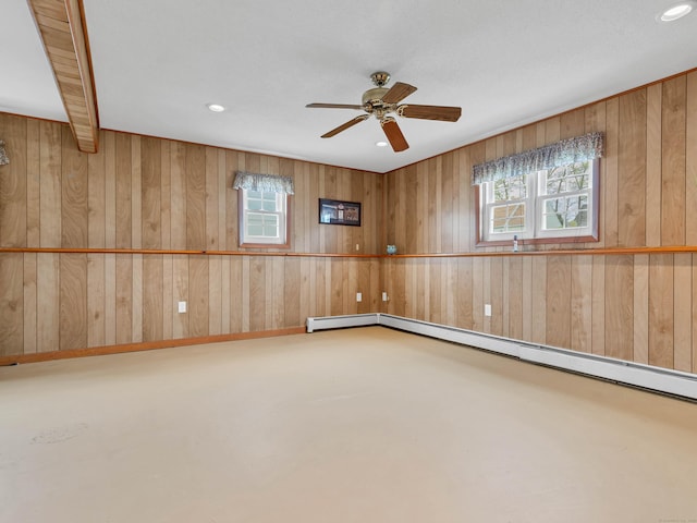 29 Washington Dr, Groton, CT 06340 - spare room featuring wooden walls, a baseboard radiator, a ceiling fan, and recessed lighting