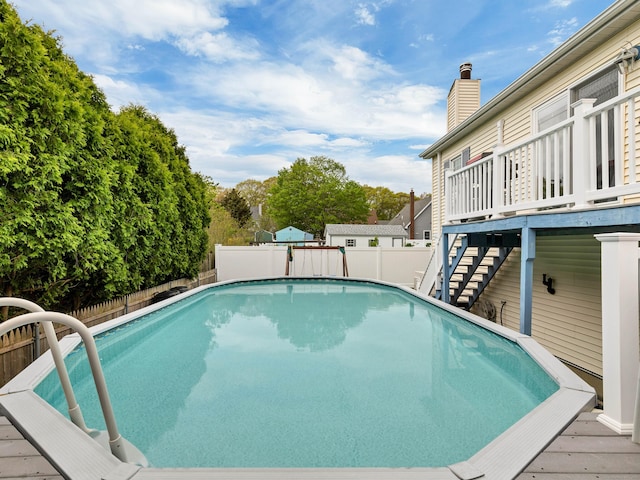 29 Washington Dr, Groton, CT 06340 - view of pool featuring stairway, a deck, a fenced in pool, and a fenced backyard
