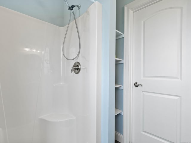 bathroom featuring a shower