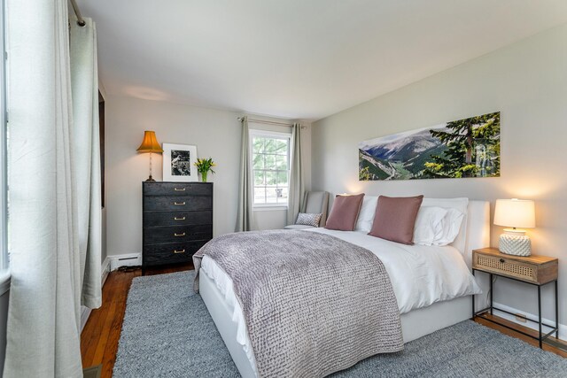 108 E St, Washington, CT 06793 - bedroom featuring a baseboard radiator and wood finished floors
