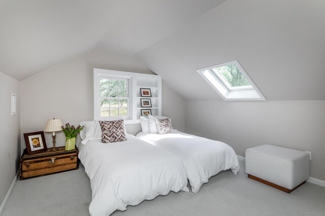 108 E St, Washington, CT 06793 - carpeted bedroom with baseboards and vaulted ceiling with skylight