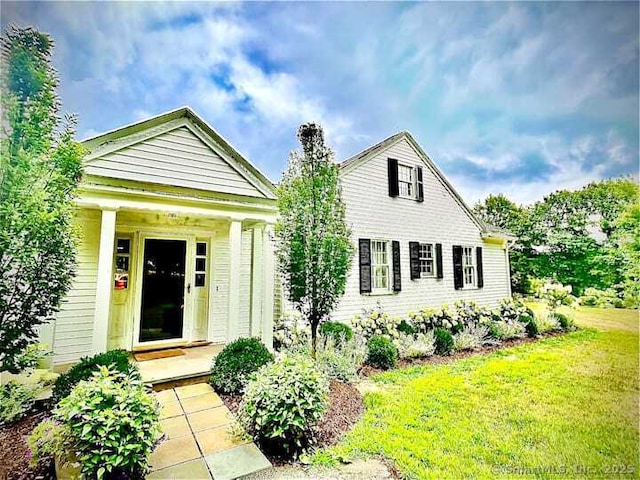 108 E St, Washington, CT 06793 - view of front of property with a front lawn