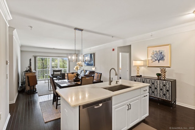 kitchen with crown molding, a sink, dishwasher, open floor plan, and dark wood-type flooring