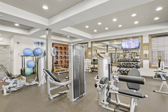 exercise room with recessed lighting