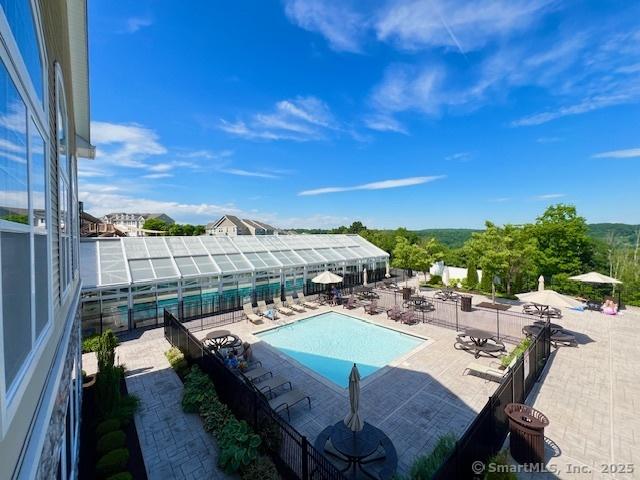 pool with a patio area