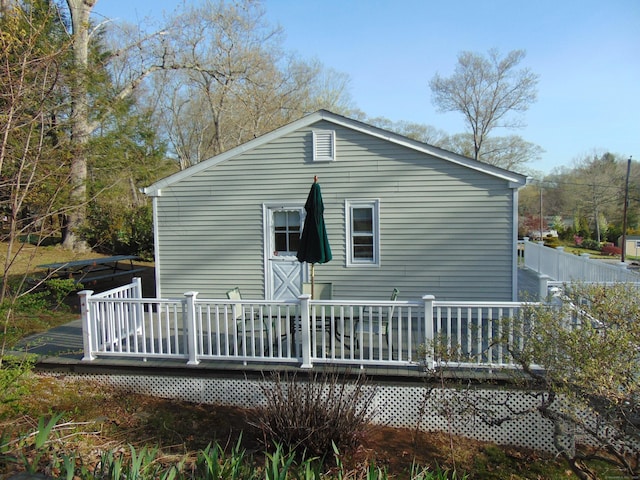 rear view of house with a deck