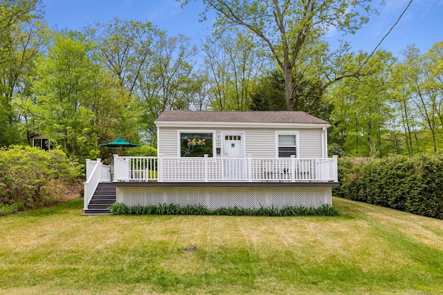 17 Glimmer Gln, East Haddam, CT 06415 - view of front of home with a wooden deck, a front lawn, stairway, and view of wooded area