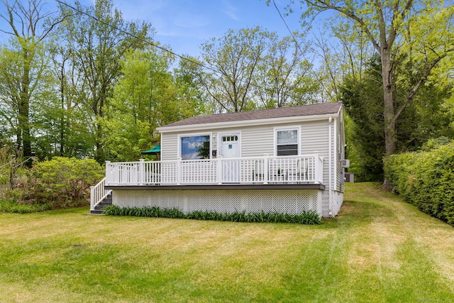 17 Glimmer Gln, East Haddam, CT 06415 - back of property with a wooden deck and a yard