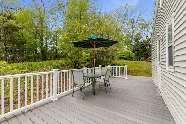 17 Glimmer Gln, East Haddam, CT 06415 - wooden terrace with outdoor dining area and view of scattered trees