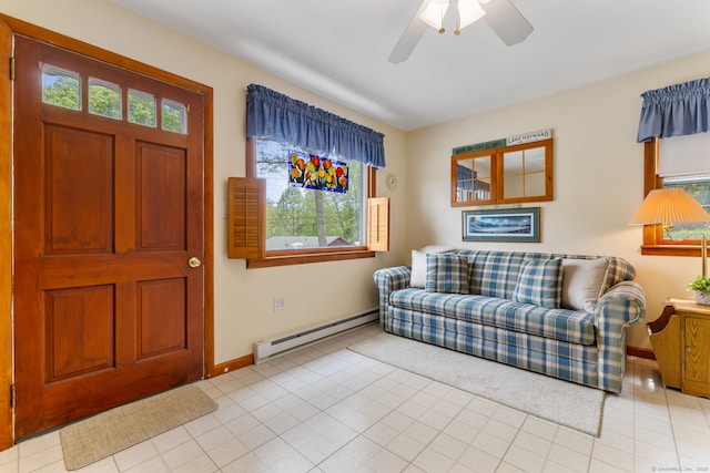 17 Glimmer Gln, East Haddam, CT 06415 - foyer featuring a baseboard radiator, a ceiling fan, baseboards, and light tile patterned floors