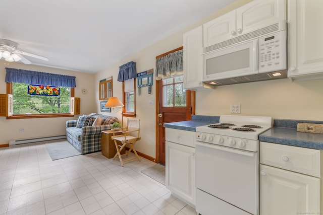 17 Glimmer Gln, East Haddam, CT 06415 - kitchen with white appliances, a baseboard heating unit, dark countertops, baseboards, and a ceiling fan