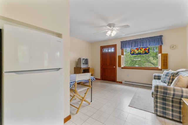 17 Glimmer Gln, East Haddam, CT 06415 - entrance foyer with a baseboard heating unit, healthy amount of natural light, a ceiling fan, and baseboards