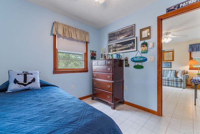 17 Glimmer Gln, East Haddam, CT 06415 - bedroom with baseboards, light tile patterned flooring, and ceiling fan