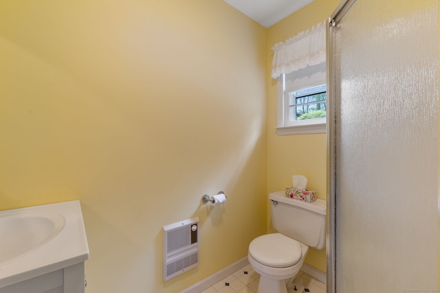 17 Glimmer Gln, East Haddam, CT 06415 - bathroom featuring heating unit, toilet, baseboards, tile patterned flooring, and vanity