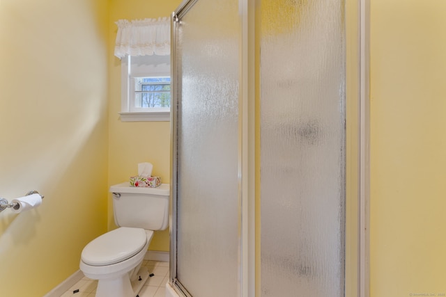 17 Glimmer Gln, East Haddam, CT 06415 - bathroom with a shower stall, baseboards, toilet, and tile patterned floors