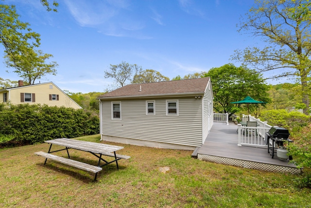 17 Glimmer Gln, East Haddam, CT 06415 - rear view of house featuring a lawn, a wooden deck, and a shingled roof