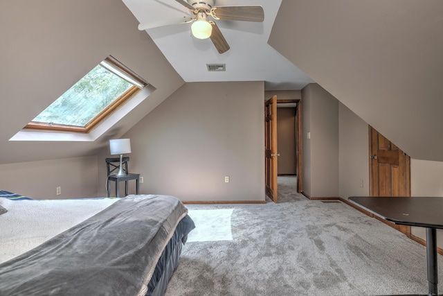 1540 Paradise Ave, Hamden, CT 06514 - bedroom with a skylight, carpet floors, lofted ceiling, baseboards, and a ceiling fan