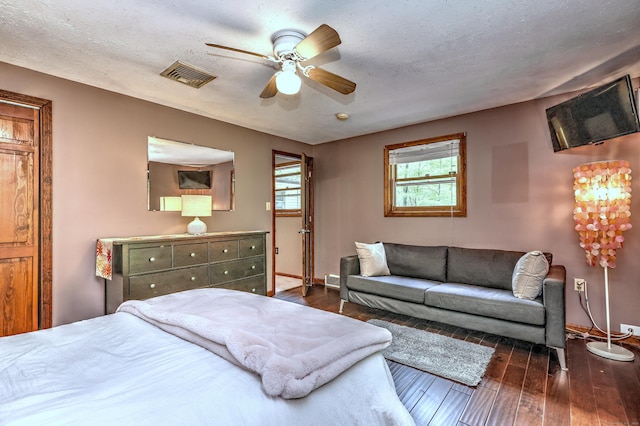 1540 Paradise Ave, Hamden, CT 06514 - bedroom with wood finished floors, baseboards, a textured ceiling, and ceiling fan