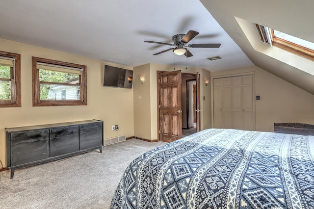 1540 Paradise Ave, Hamden, CT 06514 - carpeted bedroom featuring a skylight, baseboards, a ceiling fan, a closet, and lofted ceiling