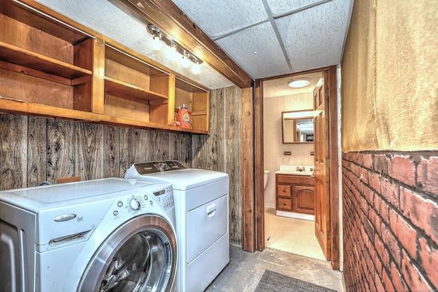1540 Paradise Ave, Hamden, CT 06514 - laundry area with washing machine and dryer and wooden walls