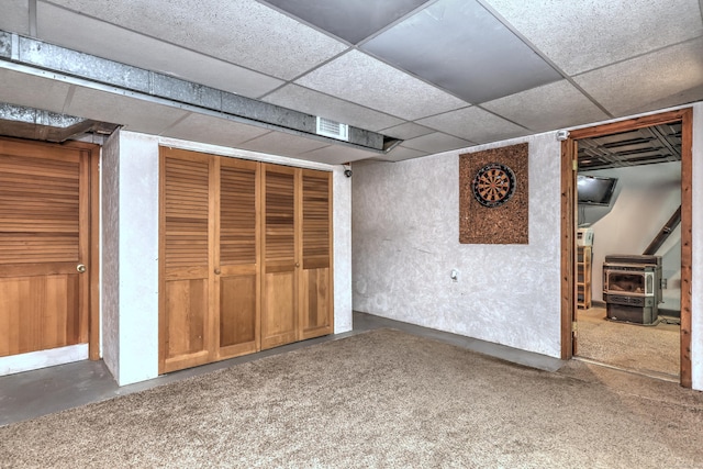 1540 Paradise Ave, Hamden, CT 06514 - finished basement with a wood stove and a paneled ceiling