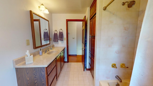 bathroom with vanity, tile patterned floors, and shower / bathtub combination