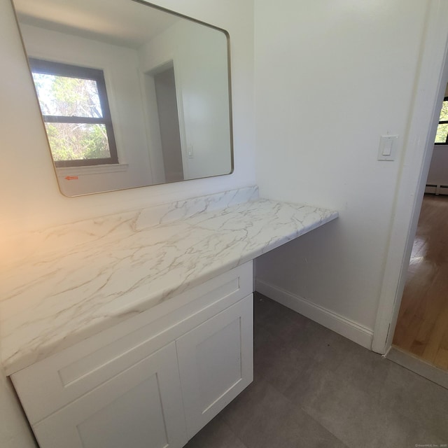 91 Jennifer Rd, Hamden, CT 06514 - bathroom featuring baseboards and vanity