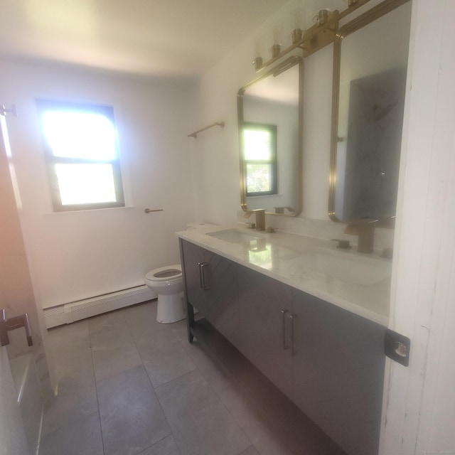 91 Jennifer Rd, Hamden, CT 06514 - full bathroom featuring baseboard heating, toilet, double vanity, and tile patterned floors