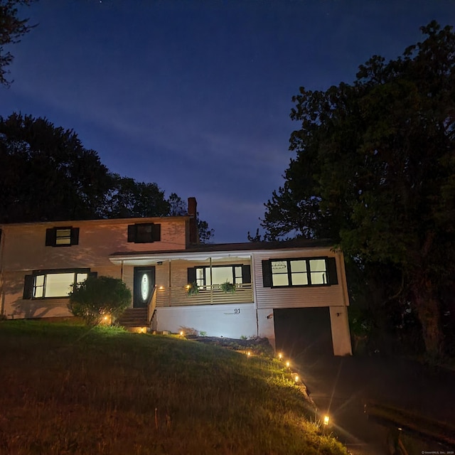 91 Jennifer Rd, Hamden, CT 06514 - view of front of property with a garage and a yard