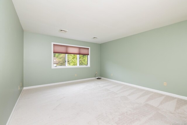 39 Amato Cir, Southington, CT 06489 - spare room with baseboards and light colored carpet