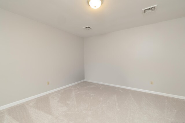 39 Amato Cir, Southington, CT 06489 - empty room featuring light colored carpet and baseboards