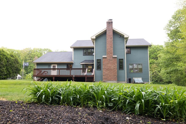 39 Amato Cir, Southington, CT 06489 - back of house with a deck, a chimney, a yard, and central AC unit