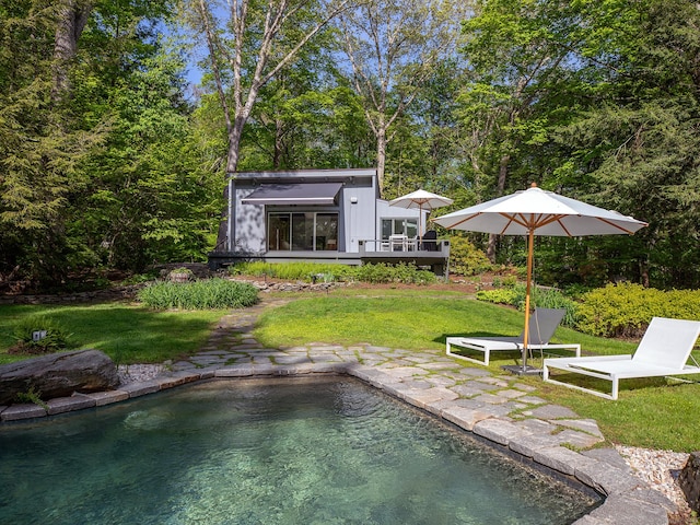 19 Spargo Rd, Roxbury, CT 06783 - rear view of house featuring a wooden deck and a lawn