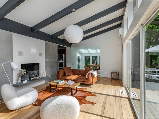 19 Spargo Rd, Roxbury, CT 06783 - living area featuring hardwood / wood-style floors, an AC wall unit, and plenty of natural light