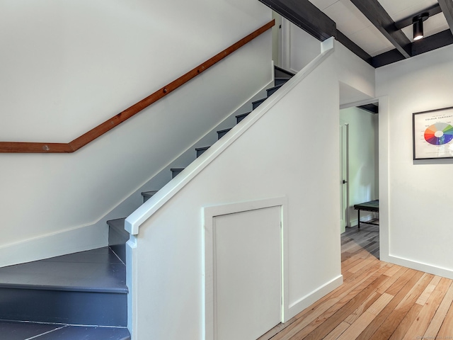 19 Spargo Rd, Roxbury, CT 06783 - staircase featuring hardwood / wood-style floors, baseboards, and beam ceiling