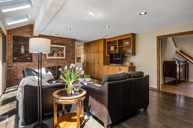 living area with brick wall, dark wood finished floors, baseboards, lofted ceiling, and recessed lighting