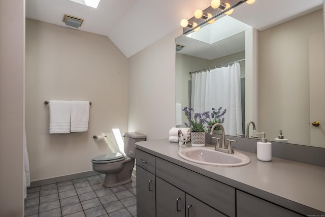 full bath with visible vents, tile patterned floors, baseboards, vanity, and toilet