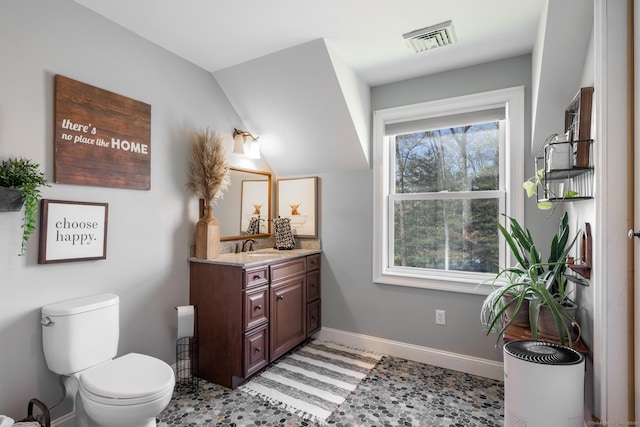 130 Upper Whittemore Rd, Middlebury, CT 06762 - bathroom with vanity, baseboards, toilet, and visible vents