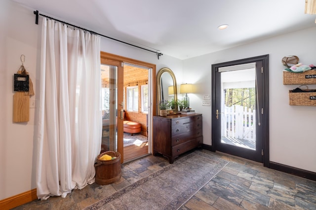 130 Upper Whittemore Rd, Middlebury, CT 06762 - doorway with baseboards, recessed lighting, and stone tile flooring