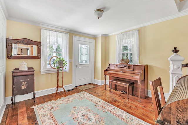 331 Elm St, Monroe, CT 06468 - foyer featuring wood-type flooring, ornamental molding, and baseboards