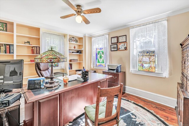 331 Elm St, Monroe, CT 06468 - office featuring wood finished floors, baseboards, a ceiling fan, ornamental molding, and built in shelves