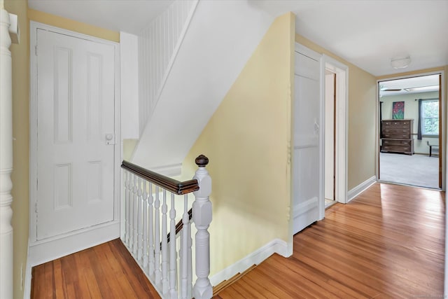 331 Elm St, Monroe, CT 06468 - staircase with wood finished floors and baseboards