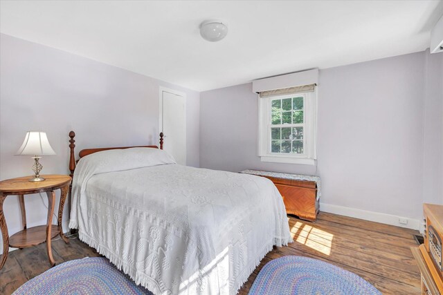 331 Elm St, Monroe, CT 06468 - bedroom featuring wood finished floors and baseboards