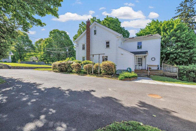 331 Elm St, Monroe, CT 06468 - view of front of house featuring a chimney