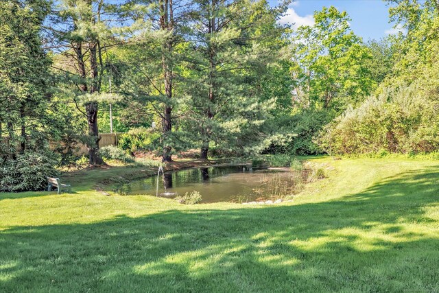 331 Elm St, Monroe, CT 06468 - view of green lawn with a water view