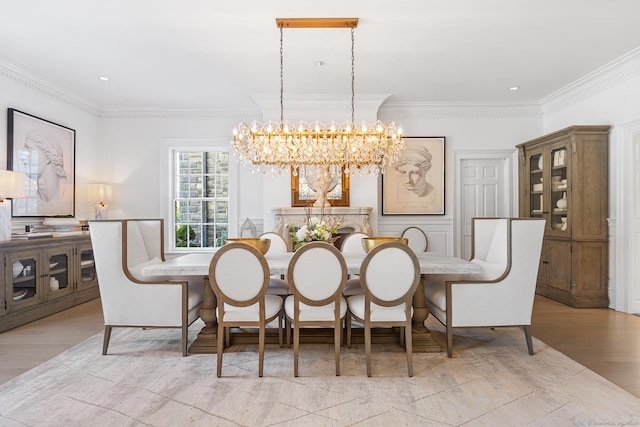 dining area featuring crown molding, recessed lighting, and a chandelier