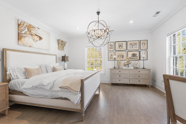 2959 Congress St, Fairfield, CT 06824 - bedroom featuring wood-type flooring, ornamental molding, and a notable chandelier