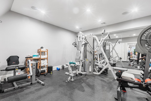 workout area with recessed lighting and lofted ceiling
