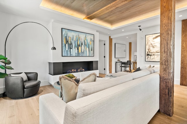 41 Richmondville Ave Unit 206, Westport, CT 06880 - living area with a raised ceiling, wood ceiling, wood finished floors, recessed lighting, and baseboards