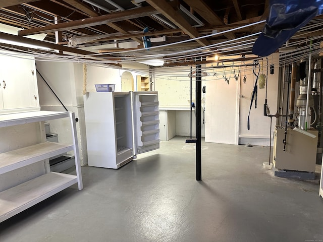 unfinished basement with a heating unit